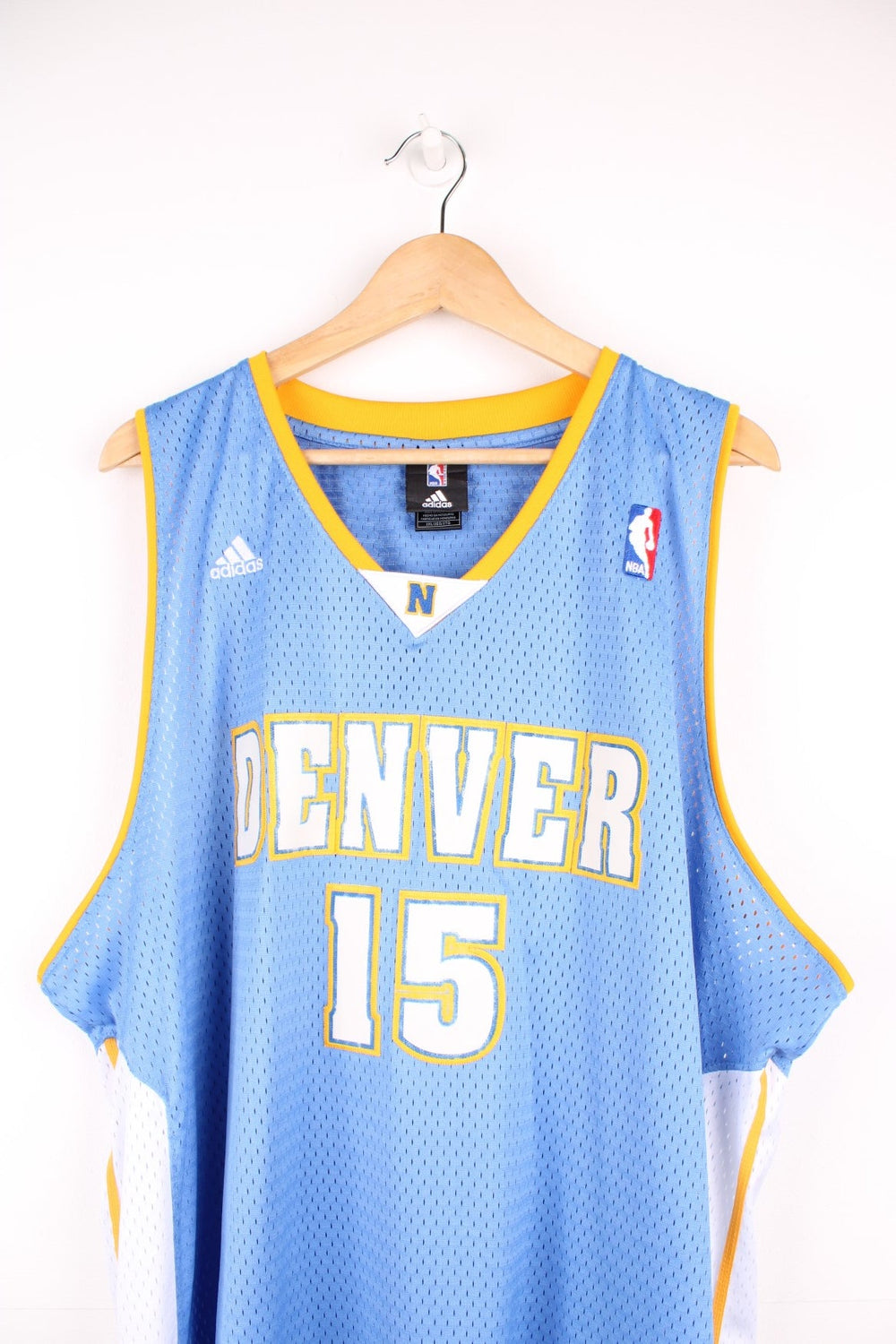 Denver Nuggets, Carmelo Anthony #15, Adidas NBA jersey in a blue, white and yellow colourway.