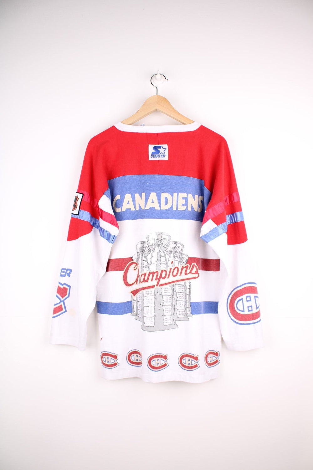 80's Montreal Canadiens Starter Champions Jersey in white with red and blue panels, Champion C logos throughout and trophy graphic on the back.