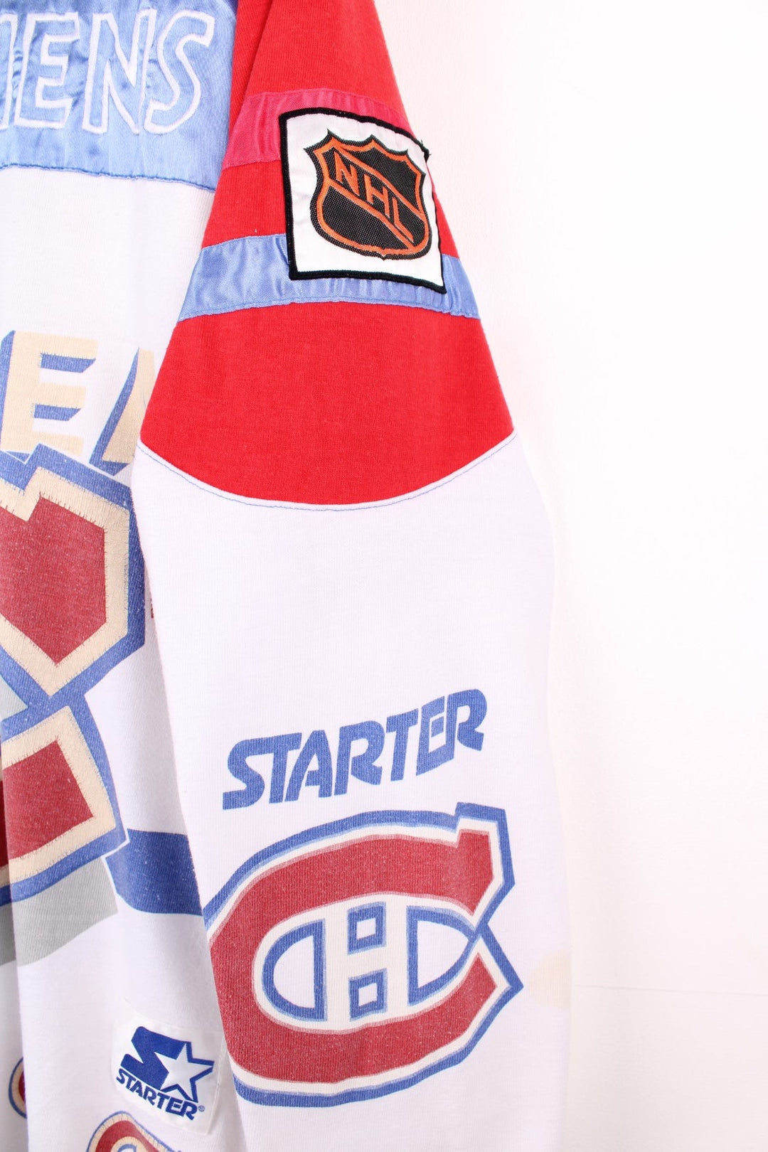 80's Montreal Canadiens Starter Champions Jersey in white with red and blue panels, Champion C logos throughout and trophy graphic on the back.