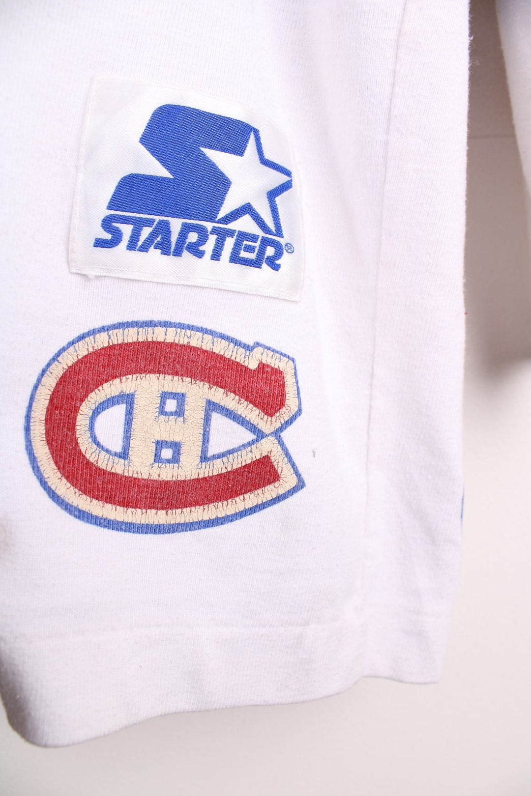 80's Montreal Canadiens Starter Champions Jersey in white with red and blue panels, Champion C logos throughout and trophy graphic on the back.