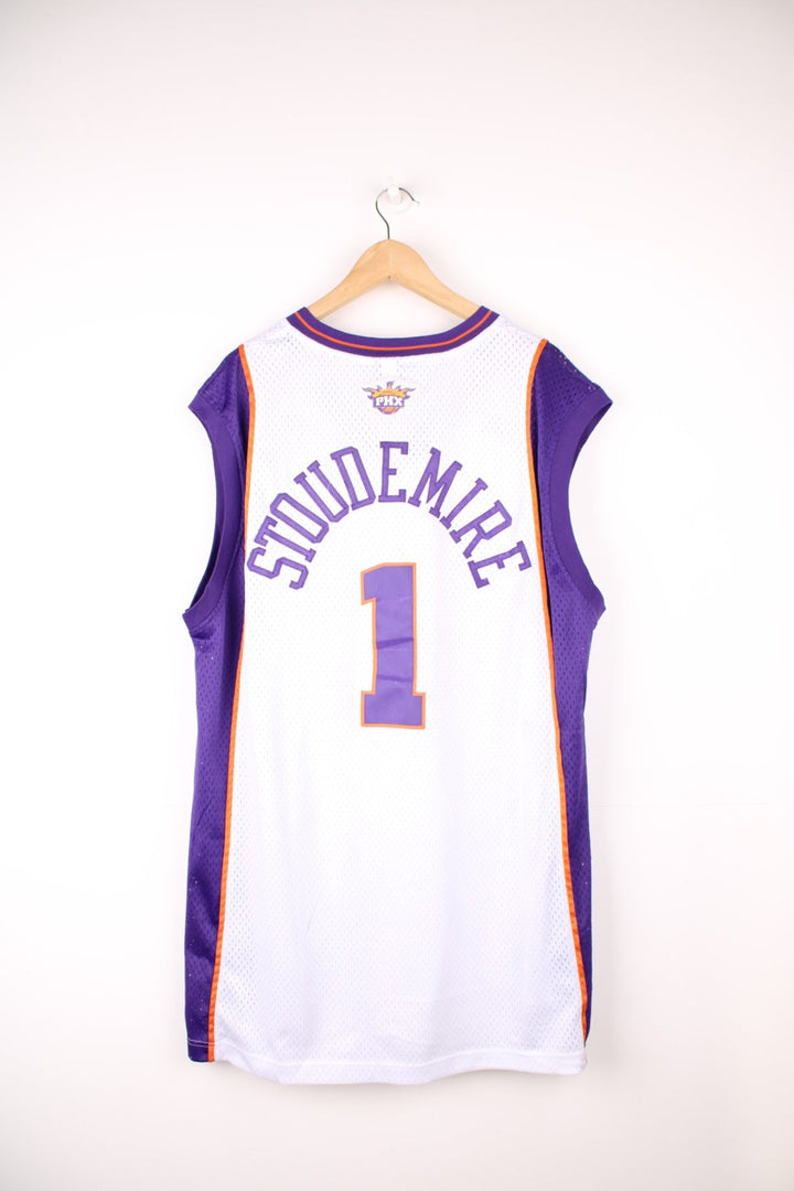 Phoenix Suns Amar'e Stoudemire #1 Adidas NBA jersey in a white, purple and orange colourway. Features embroidered lettering and logos on the chest.