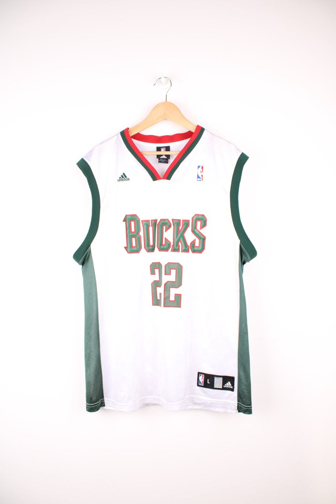 Milwaukee Bucks, Redd #22 Adidas NBA jersey in a white, green and red colourway. Features printed lettering and embroidered logos on the chest. 