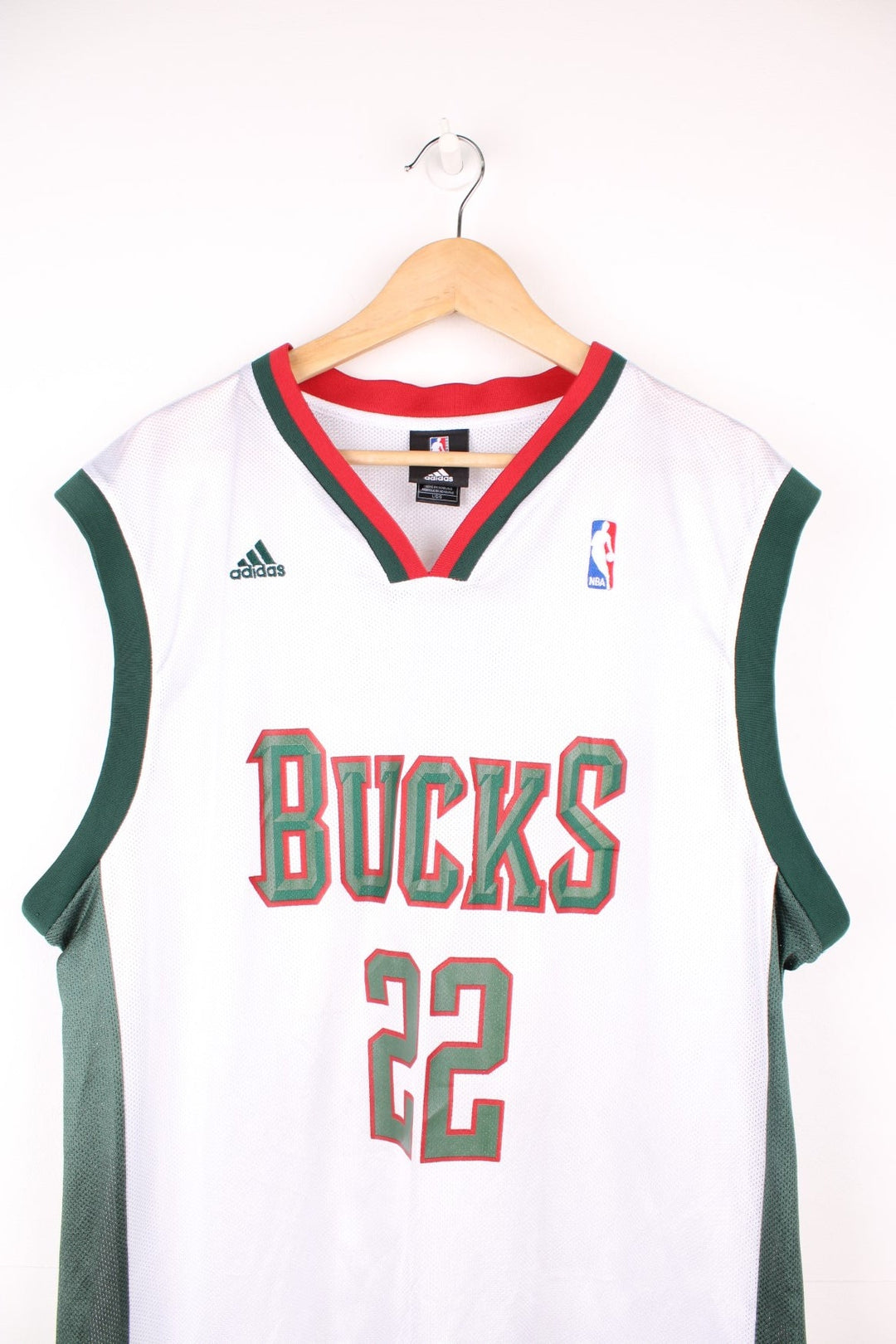 Milwaukee Bucks, Redd #22 Adidas NBA jersey in a white, green and red colourway. Features printed lettering and embroidered logos on the chest. 