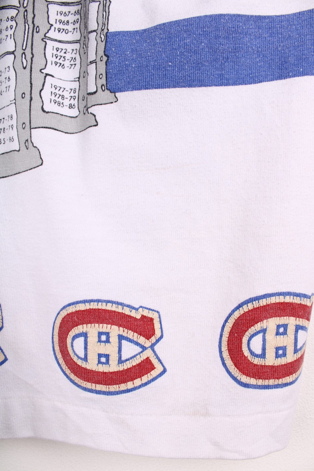 80's Montreal Canadiens Starter Champions Jersey in white with red and blue panels, Champion C logos throughout and trophy graphic on the back.