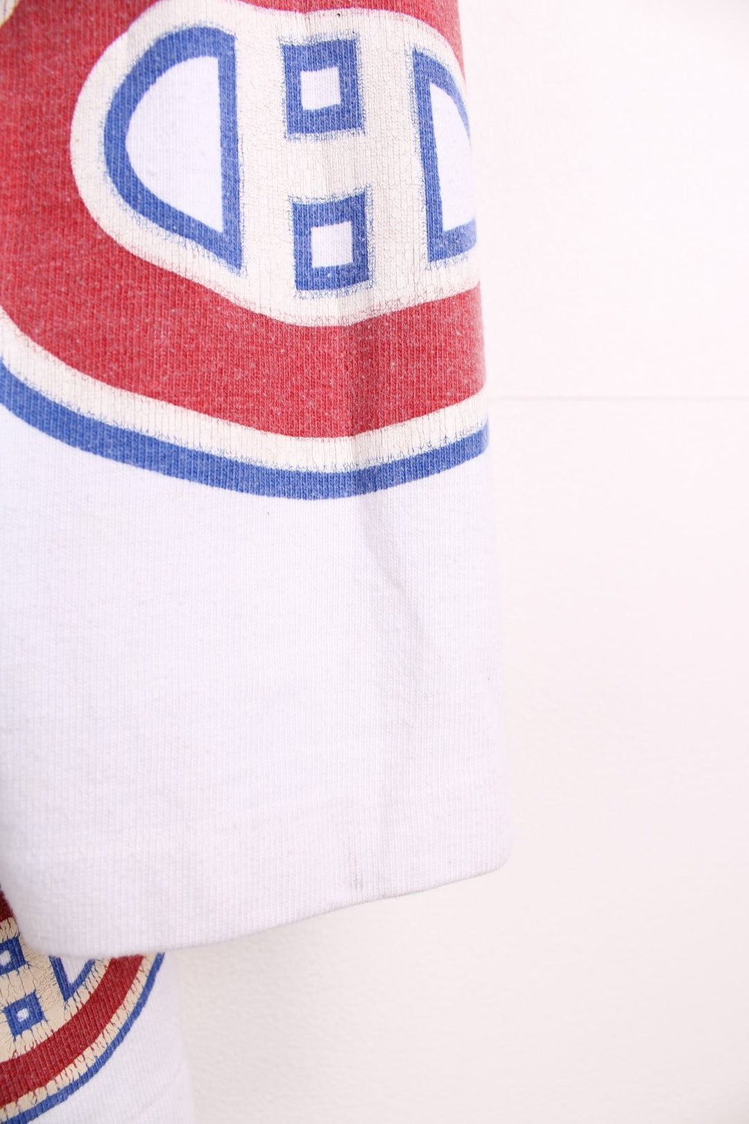 80's Montreal Canadiens Starter Champions Jersey in white with red and blue panels, Champion C logos throughout and trophy graphic on the back.