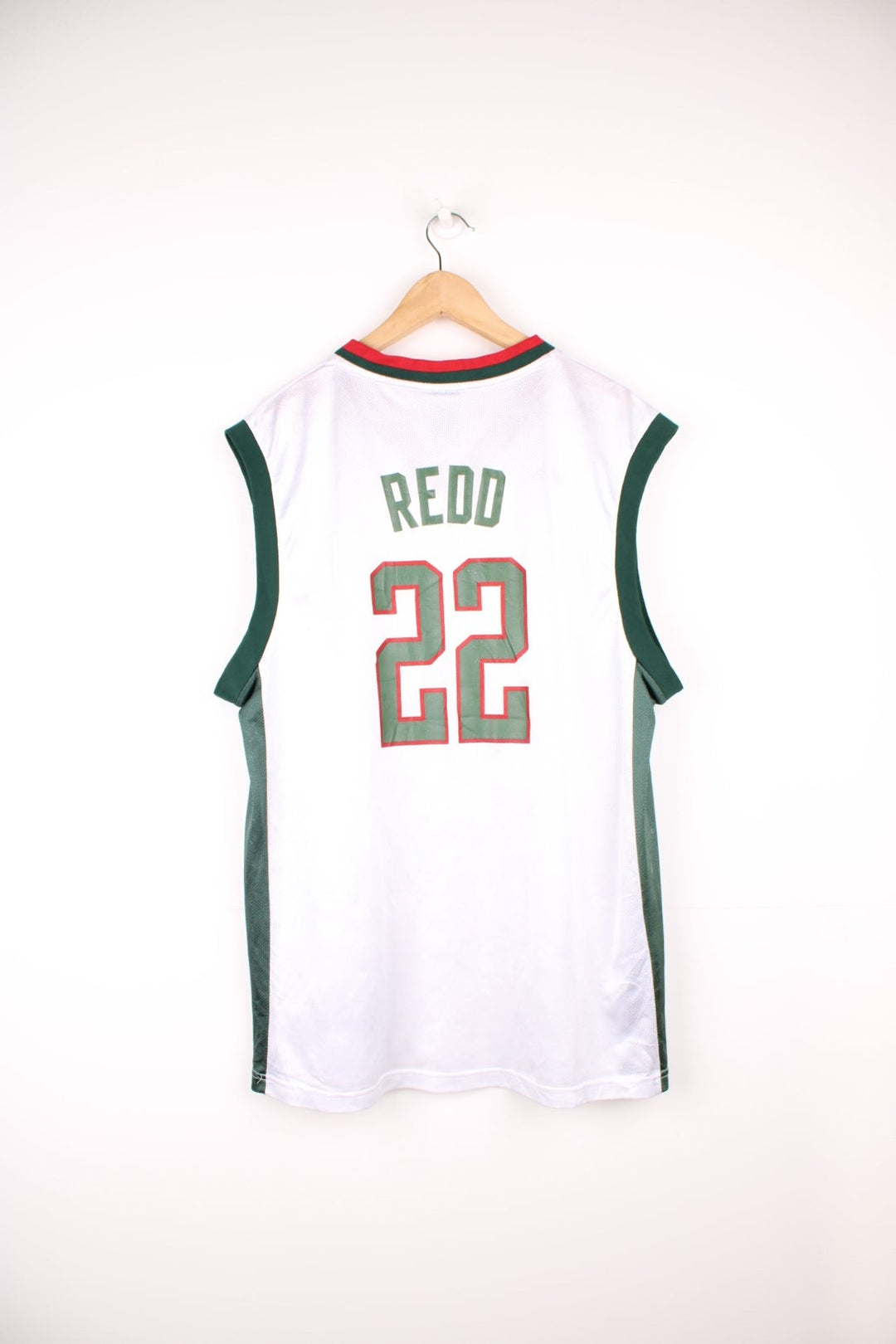 Milwaukee Bucks, Redd #22 Adidas NBA jersey in a white, green and red colourway. Features printed lettering and embroidered logos on the chest. 