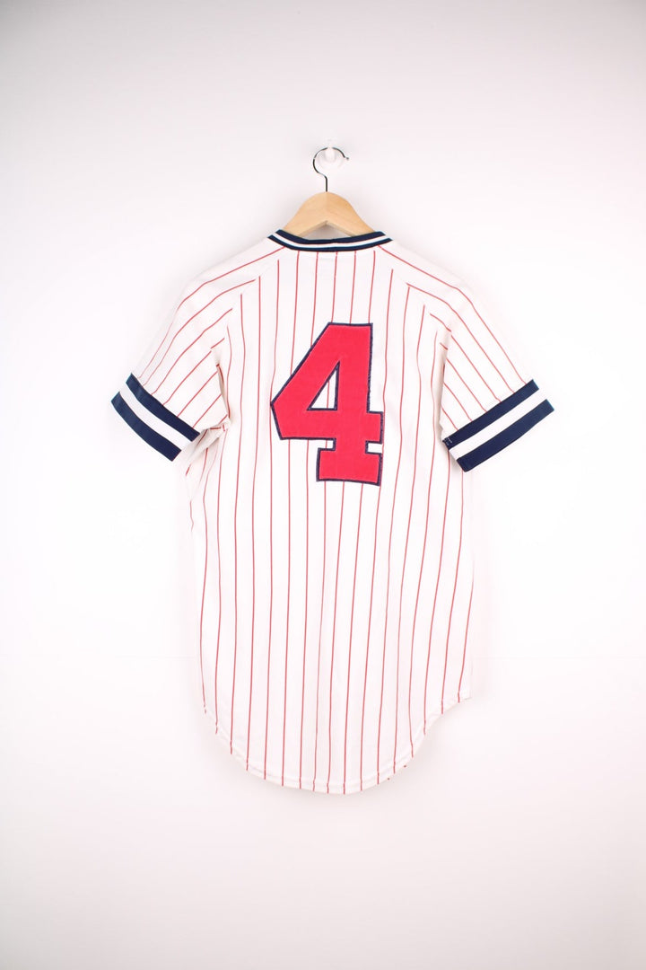 Wilson Vikes baseball jersey in white with red pinstripes, navy blue collar and cuffs, a red spellout, and no. 4 on the front and back..