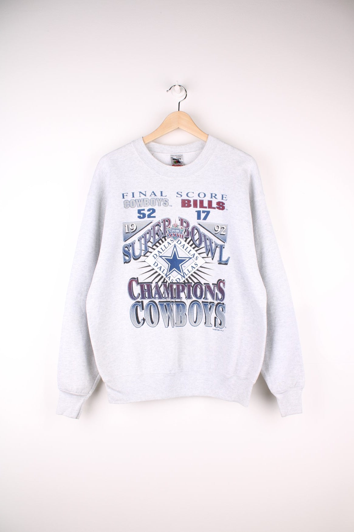 Vintage 1992 Dallas Cowboys Super Bowl Champions Sweatshirt in a grey colourway with the score and team spell out logo printed on the front. 