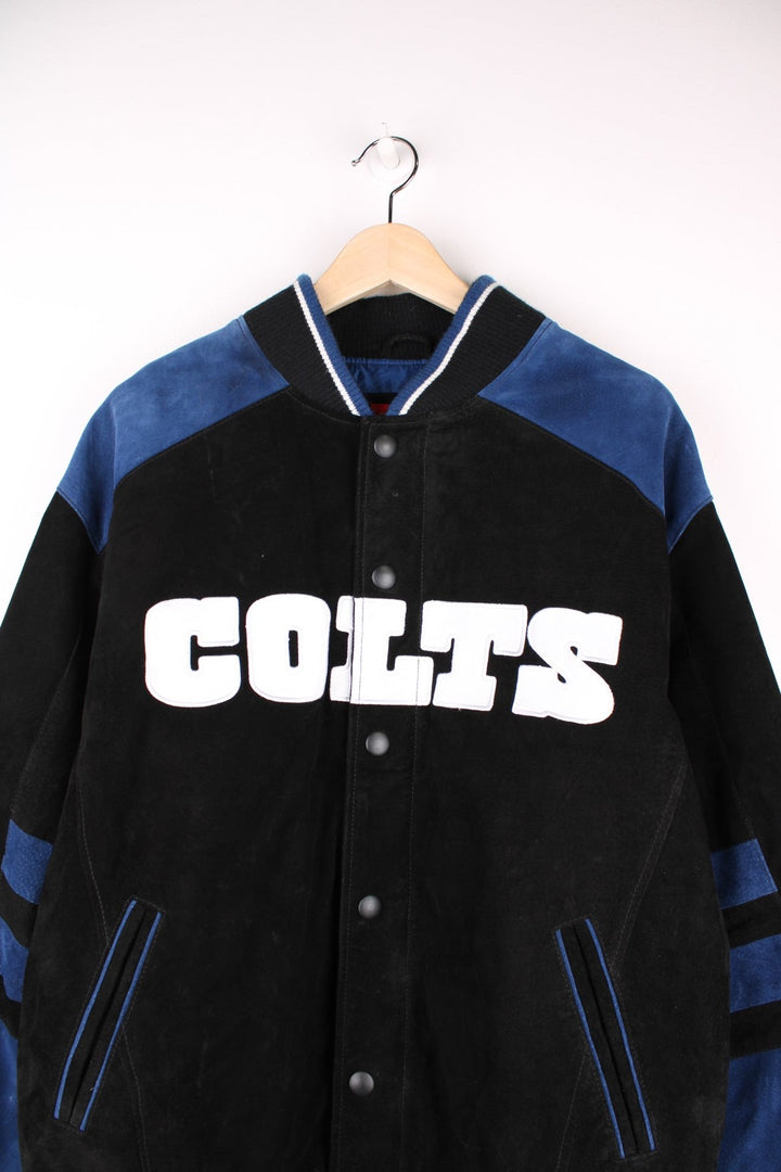 Indianapolis Colts Leather Varsity Jacket in a black and blue colourway, button up with side pockets, insulated with a quilted lining, and has the team spell out and logo embroidered on the front and back.