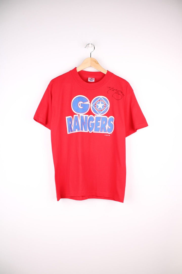 Texas Rangers MLB MLB t-shirt in red with front spellout in blue and team names list on the back.