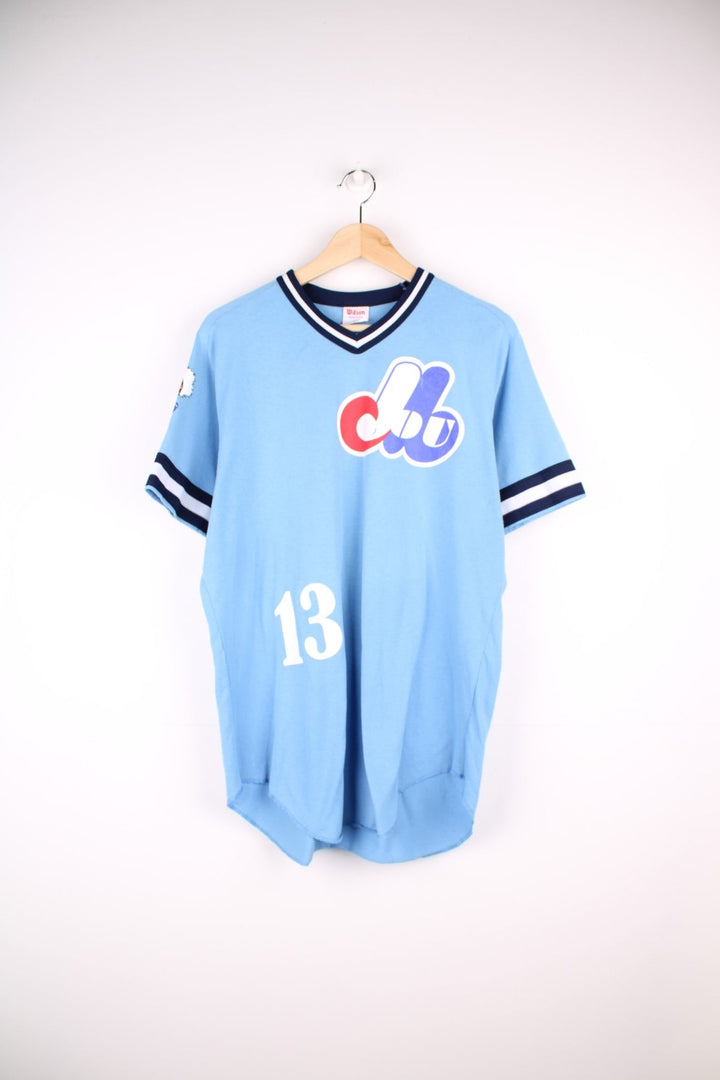 Wilson Montreal Expos MLB t-shirt in blue with navy and white accents, logos printed on the front and sleeves, and no.13 front and back.