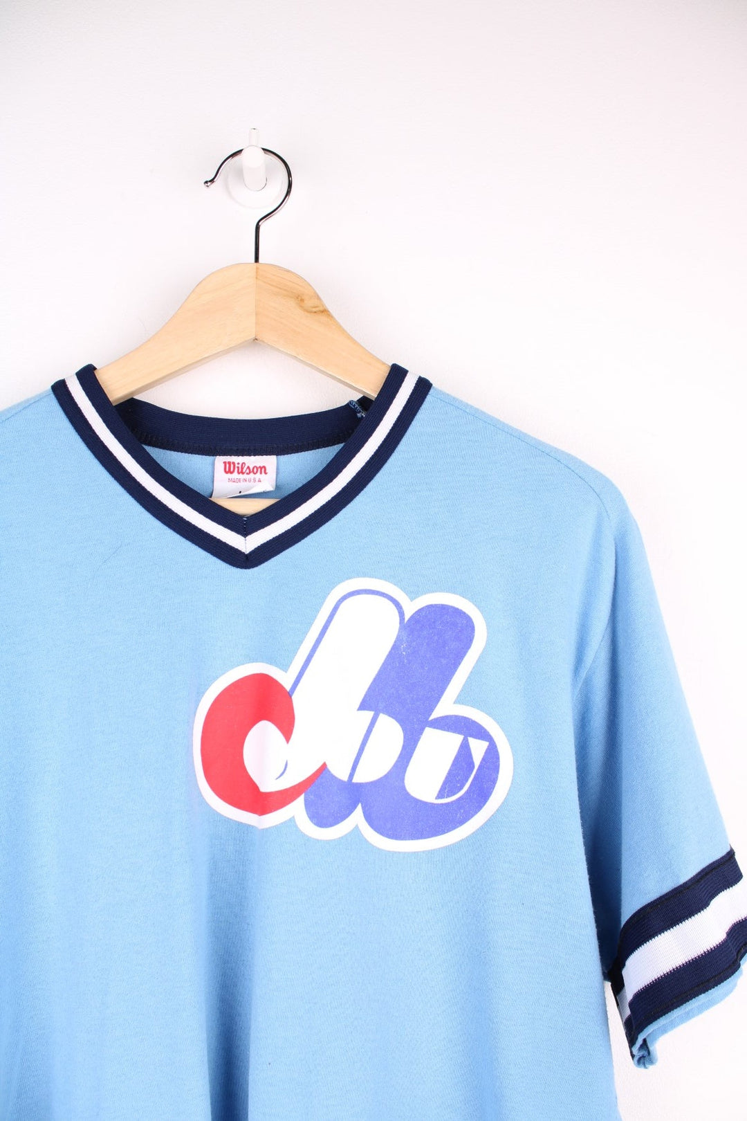 Wilson Montreal Expos MLB t-shirt in blue with navy and white accents, logos printed on the front and sleeves, and no.13 front and back.