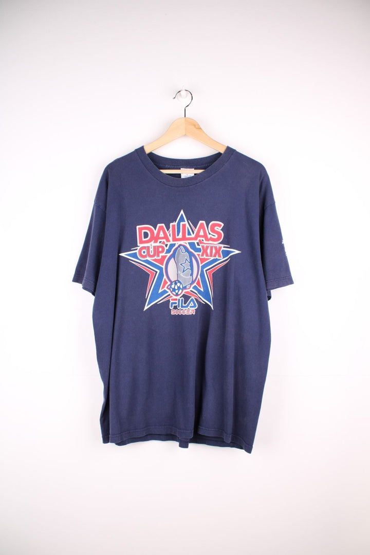 Fila FC Dallas soccer t-shirt in navy blue with front star logo graphic, spellout reading 'Dallas Cup XIX', and Fila Sport logos on the front, back and sleeve.