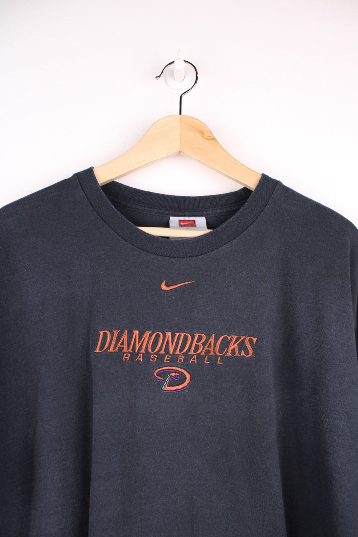 Nike Arizona Diamondbacks t-shirt in navy black with team name spellout embroidered on the front in orange.