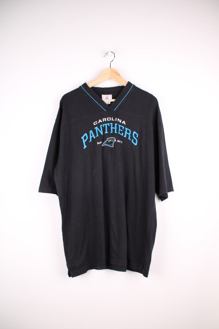 Carolina Panthers NFL t-shirt in  black with blue piping and team name and logo embroidered in blue and white.