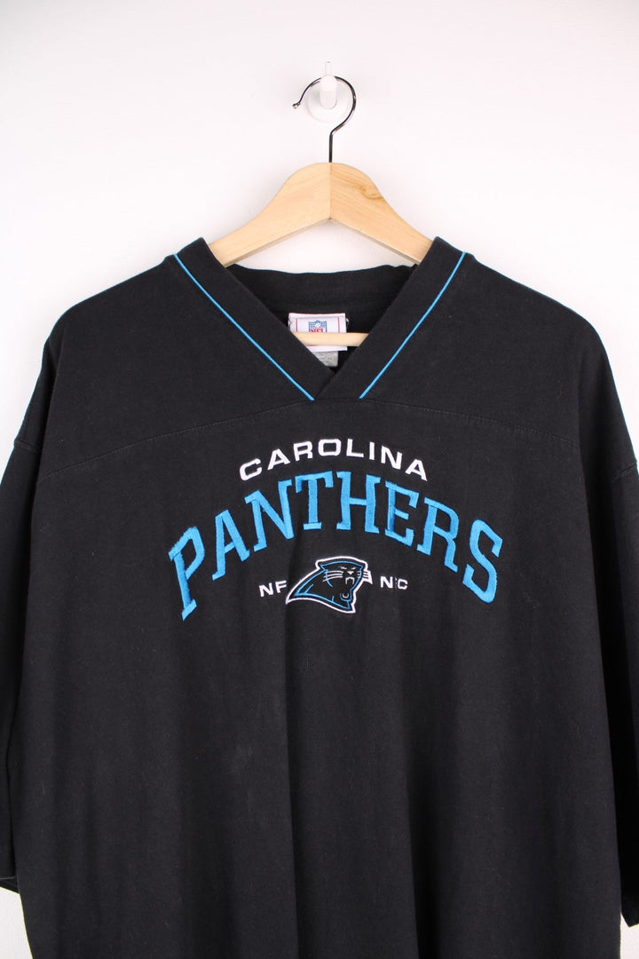 Carolina Panthers NFL t-shirt in  black with blue piping and team name and logo embroidered in blue and white.