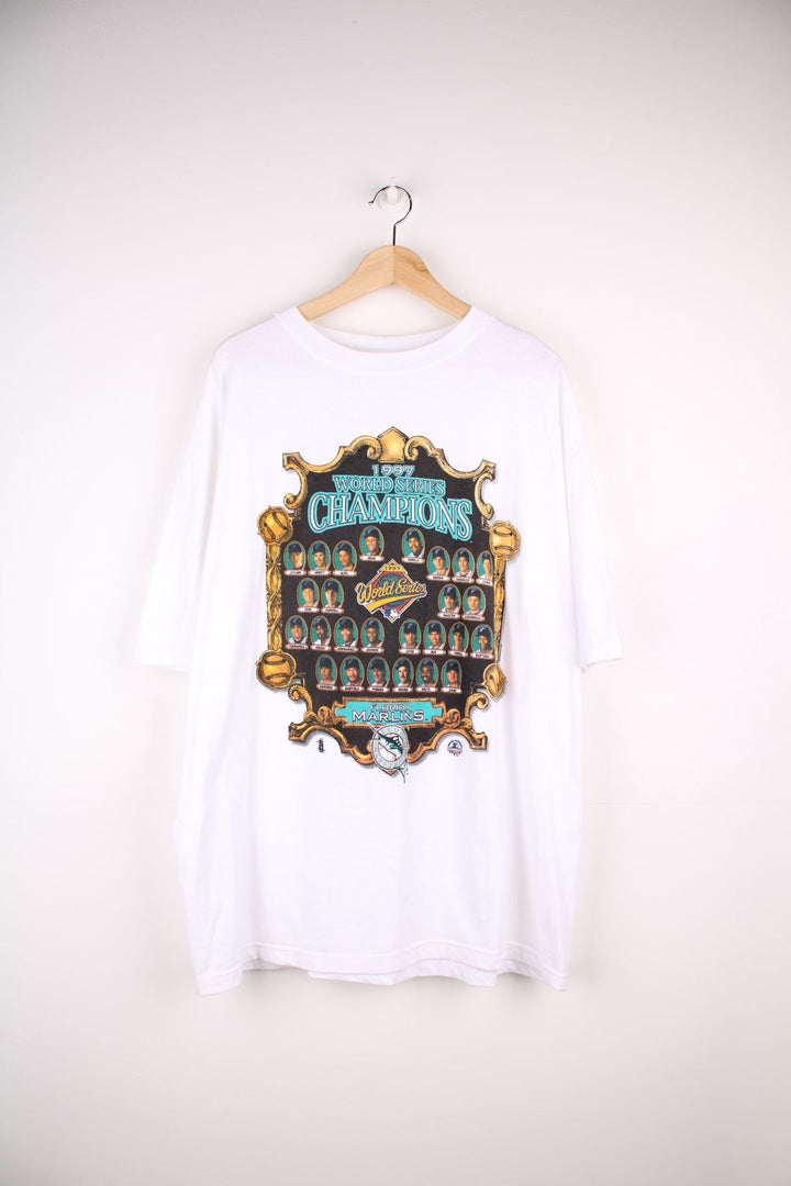 Florida Marlins 1997 World Series MLB tee in white with crest graphic with photos of players. .