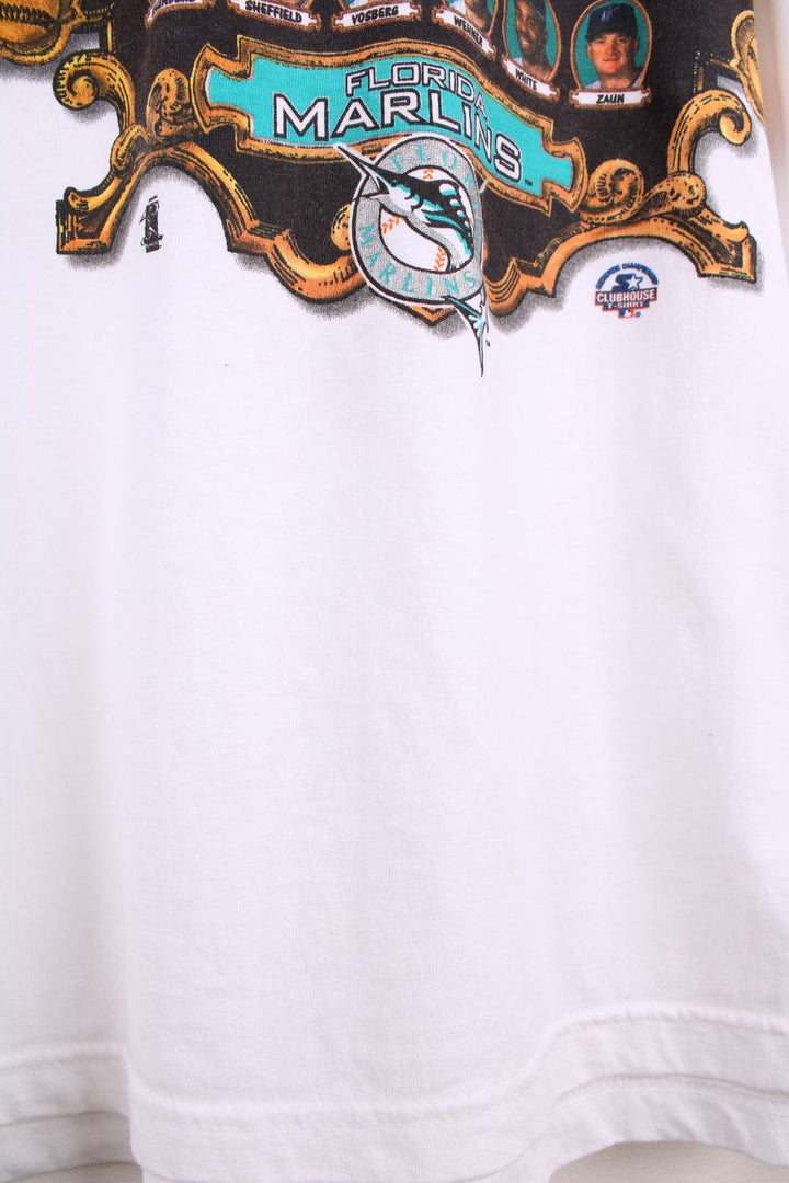 Florida Marlins 1997 World Series MLB tee in white with crest graphic with photos of players. .