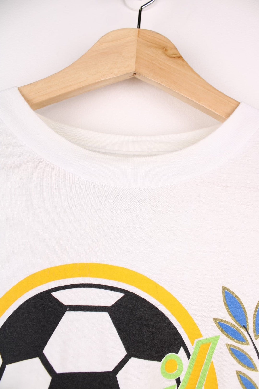 Vintage 1994 World Cup USA winners Brazil spellout t-shirt in white with football graphic and CBF crest design.