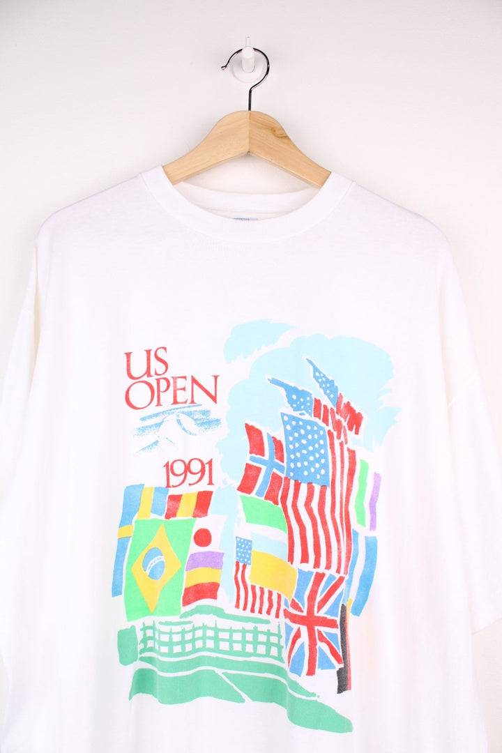 Vintage official 1991 US Open tee in white with colourful flags graphic on the front.