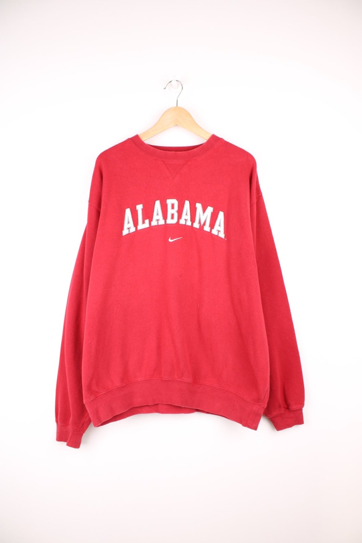 University Of Alabama Crimson Tide Football Team Nike Sweatshirt in a red and white colourway with the spell out logo embroidered across the front. 