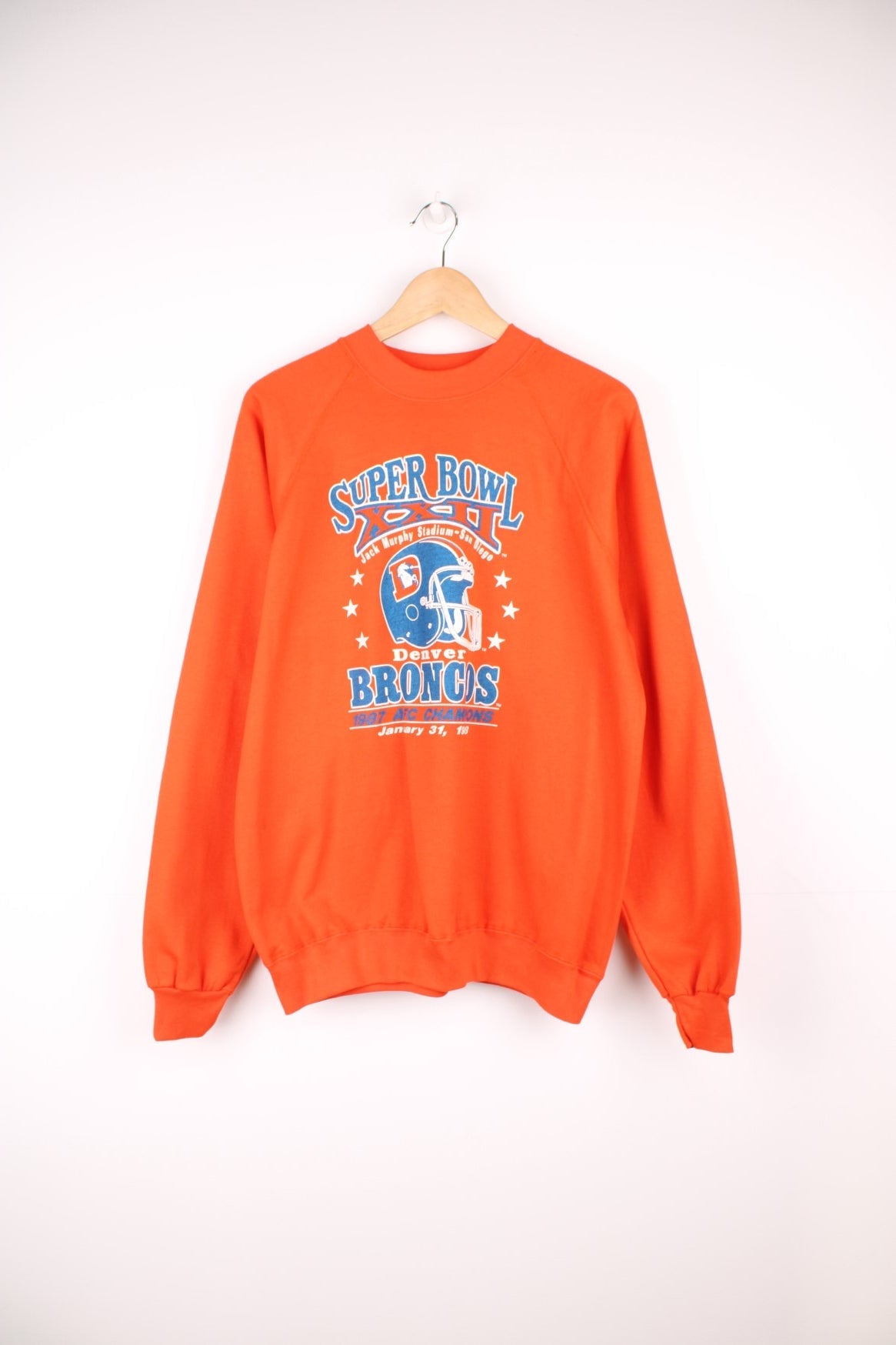 1988 Denver Broncos Super Bowl Champions Sweatshirt in a orange, blue and white colourway with the logo and spell out printed on the front. 