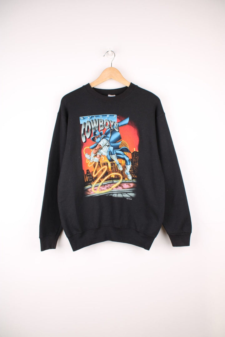 1994 Dallas Cowboys Salem Sportswear Comic Sweatshirt in a black colourway with superhero style comic graphic design printed on the front. 