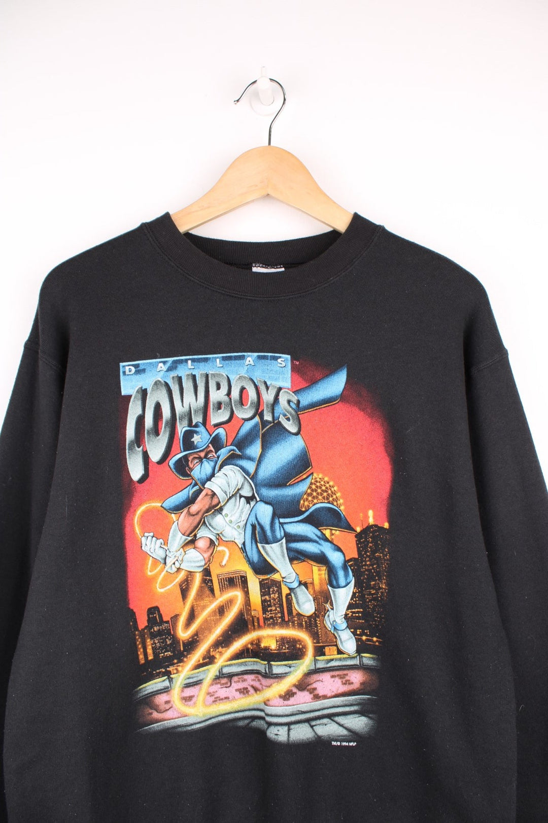 1994 Dallas Cowboys Salem Sportswear Comic Sweatshirt in a black colourway with superhero style comic graphic design printed on the front. 