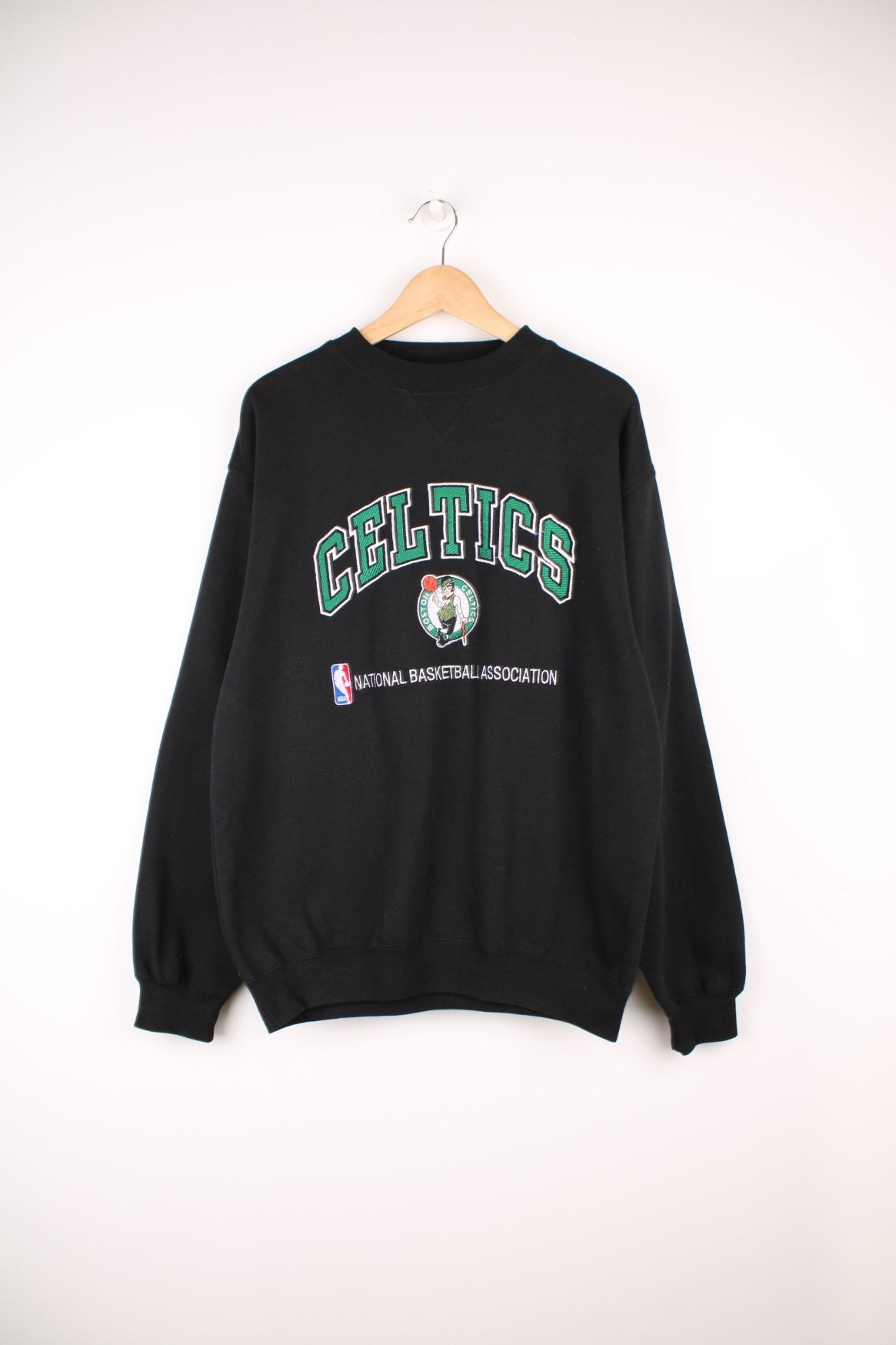 Boston Celtics NBA Sweatshirt in a black colourway with the logos and spell out embroidered on the front. 