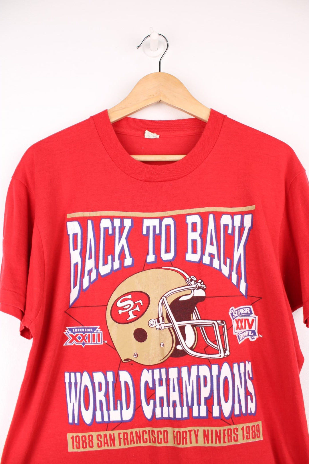 80's San Francisco 49ers Back To Back Champions T-Shirt in a red colourway with the team logo and spell out printed on the front. 