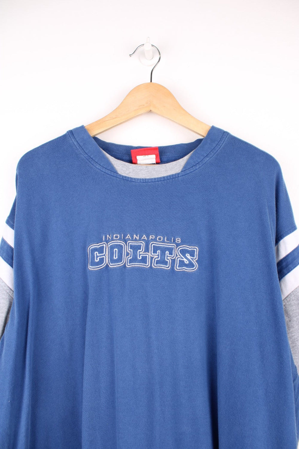 Indianapolis Colts NFL T-Shirt in a blue, grey and white colourway with the spell out logo embroidered on the front. 