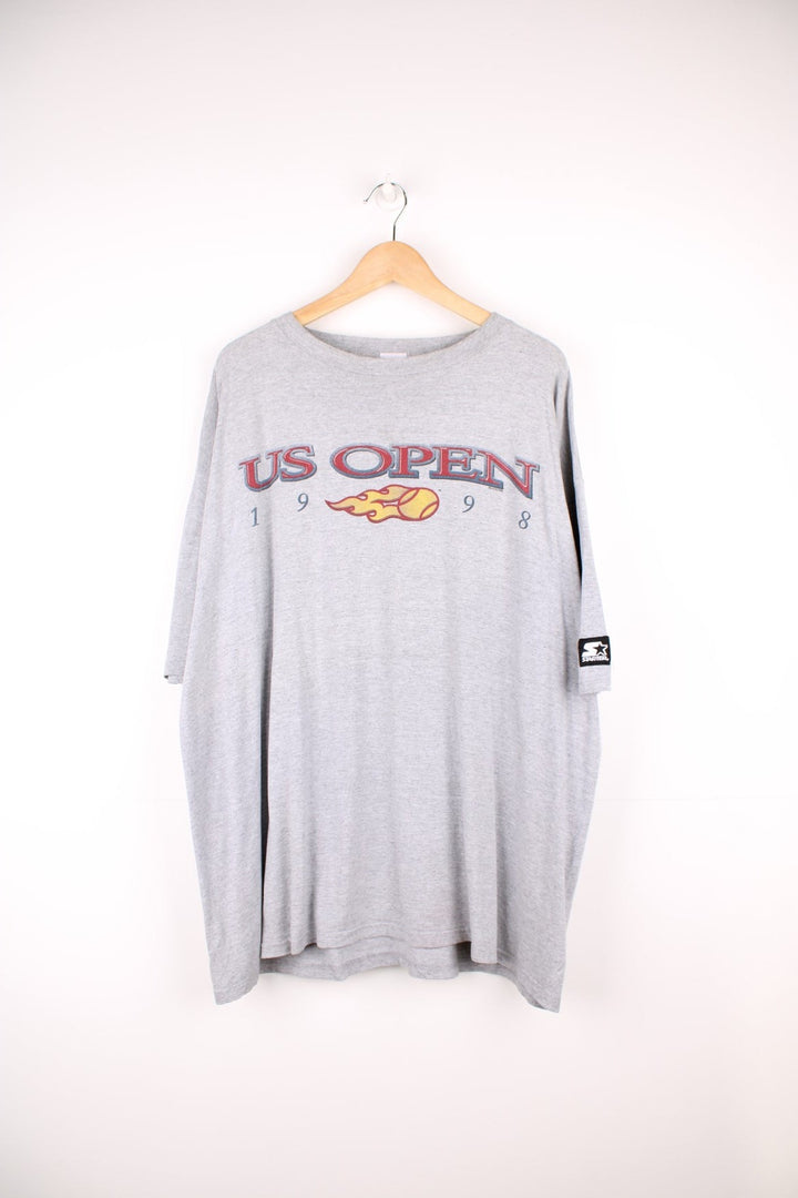 1998 US Open Starter T-Shirt in a grey colourway with the spell out logo printed across the front. 