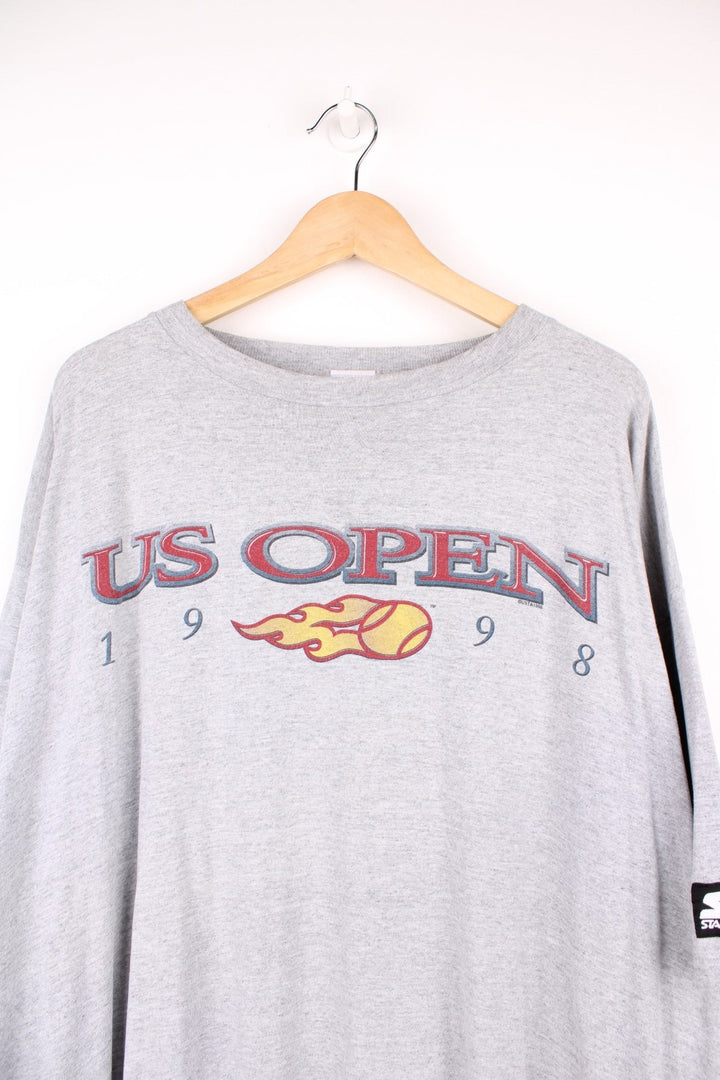 1998 US Open Starter T-Shirt in a grey colourway with the spell out logo printed across the front. 