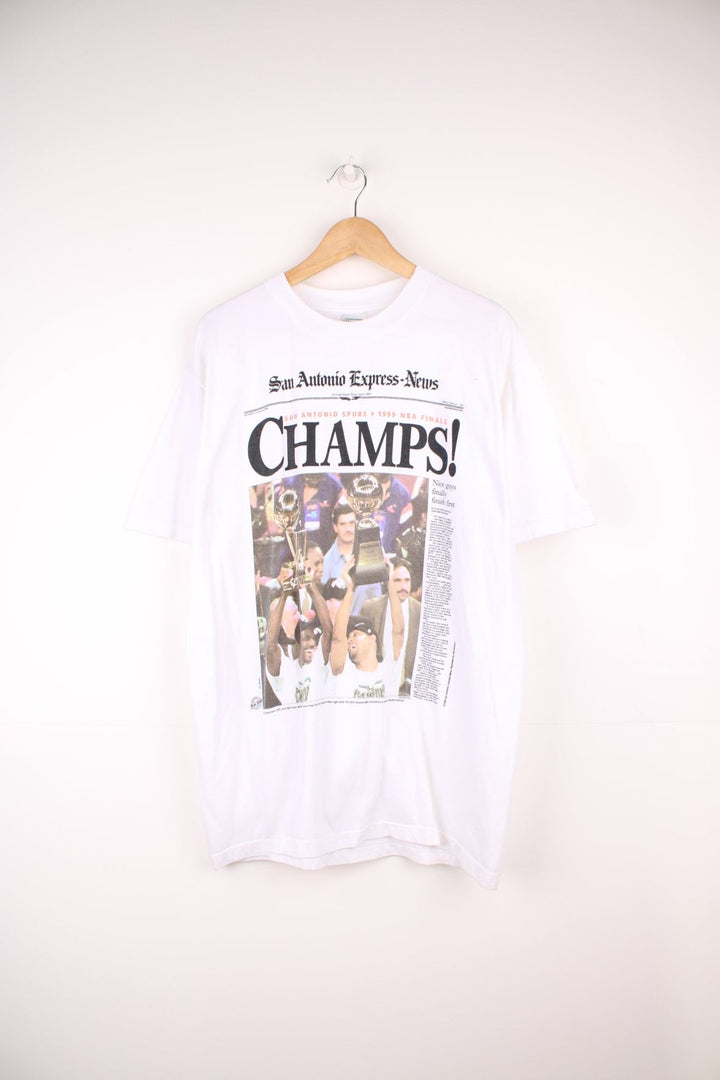 1999 San Antonio Spurs NBA Champions T-Shirt in a white colourway with a newspaper graphic design printed on the front.  