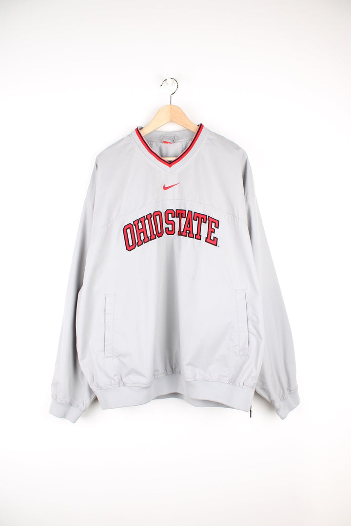 Ohio State pale grey windbreaker style pull over drill top with embroidered spell-out details across the front