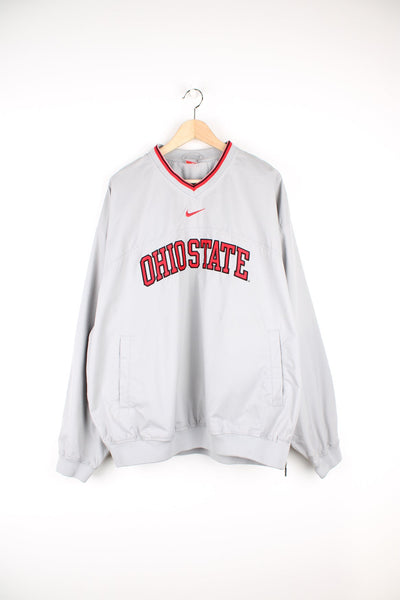 Ohio State pale grey windbreaker style pull over drill top with embroidered spell-out details across the front
