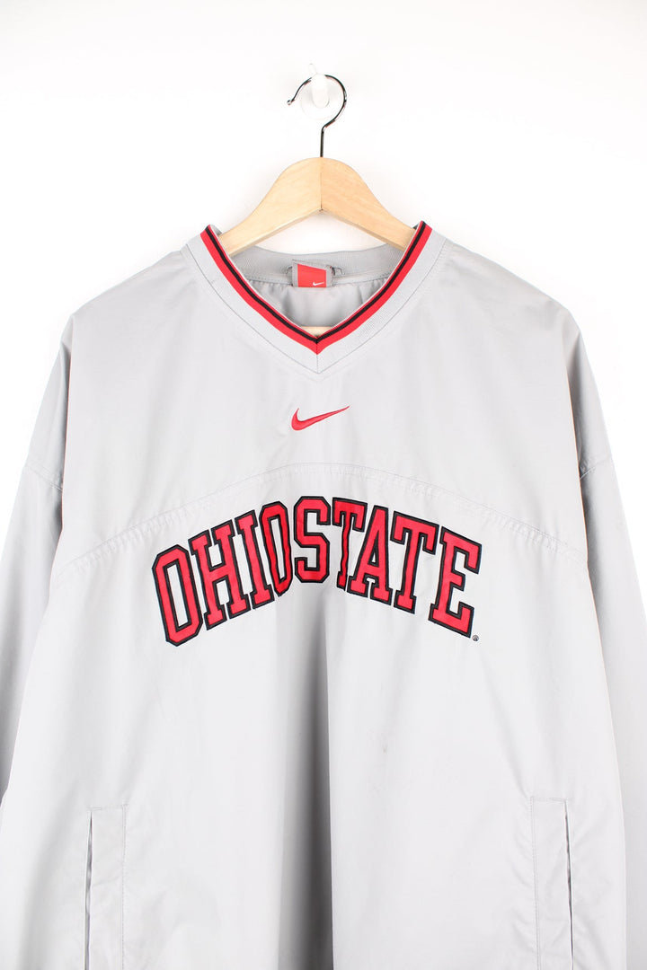 Ohio State pale grey windbreaker style pull over drill top with embroidered spell-out details across the front