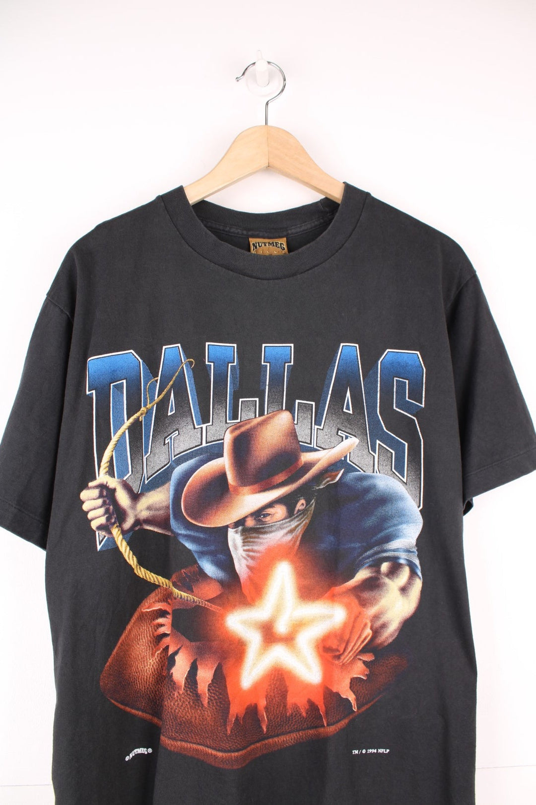 Vintage 1994 Dallas Cowboys single stitch T-Shirt with graphic print on the front and back.