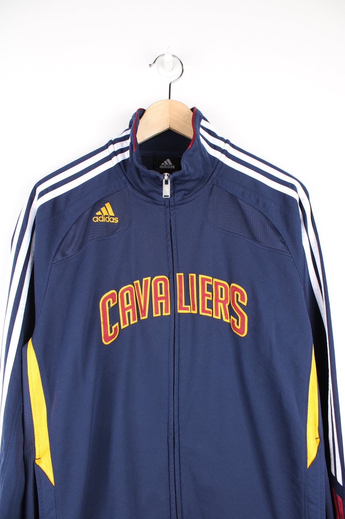 Cleveland Cavaliers navy blue zip through track top with embroidered spell-out branding across the front