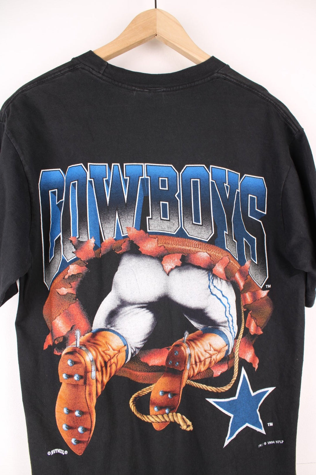 Vintage 1994 Dallas Cowboys single stitch T-Shirt with graphic print on the front and back.