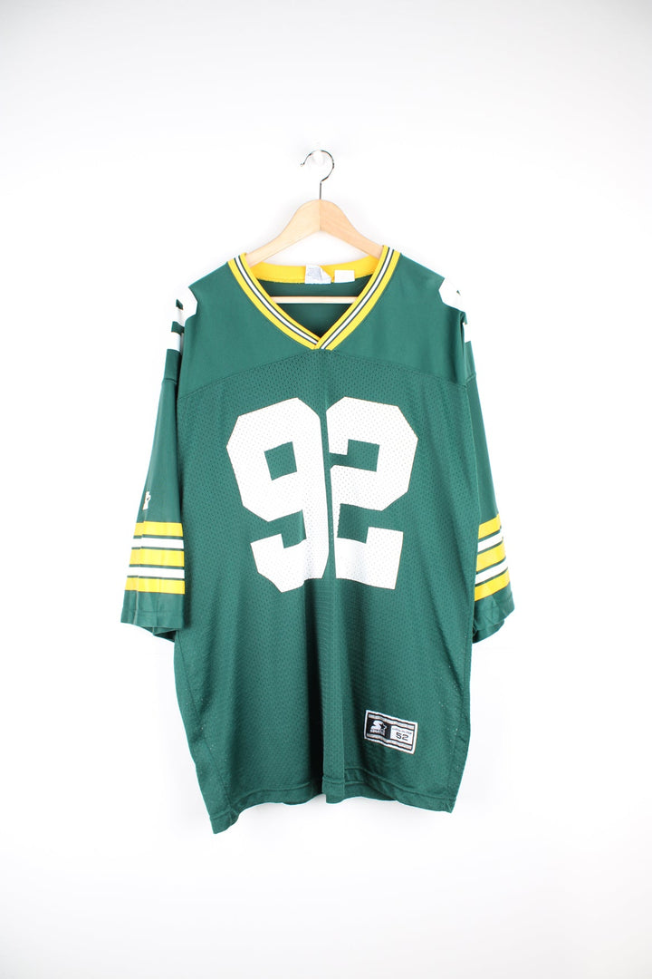 Vintage 90's Green Bay Packers x Reggie White #92 NFL jersey by Starter features printed lettering