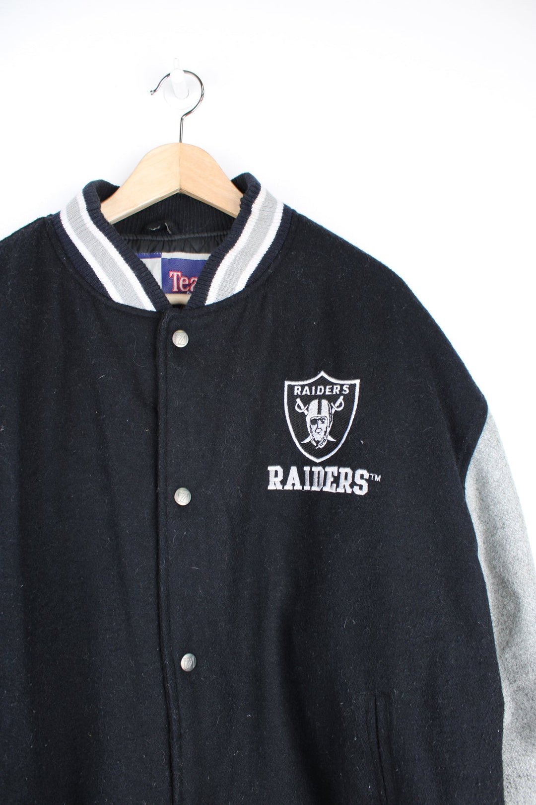 Oakland Raiders black and grey wool varsity jacket by Logo 7 features embroidered badges and lettering 