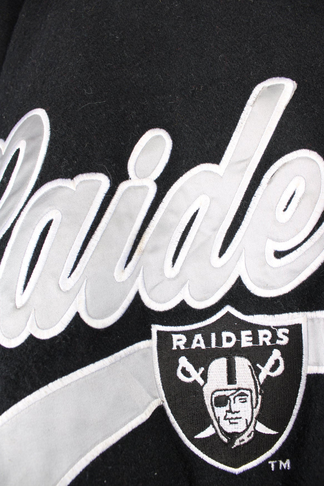 Oakland Raiders black and grey wool varsity jacket by Logo 7 features embroidered badges and lettering 