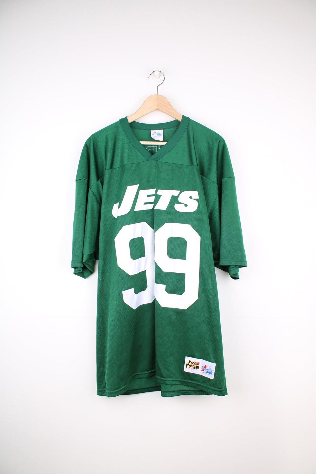 Vintage New York Jets green football jersey by Majestic. Features embroidered spell-out 'Stephie' on the back