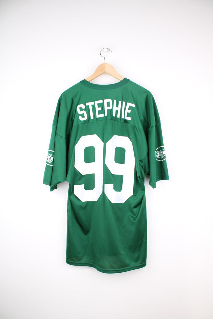 Vintage New York Jets green football jersey by Majestic. Features embroidered spell-out 'Stephie' on the back