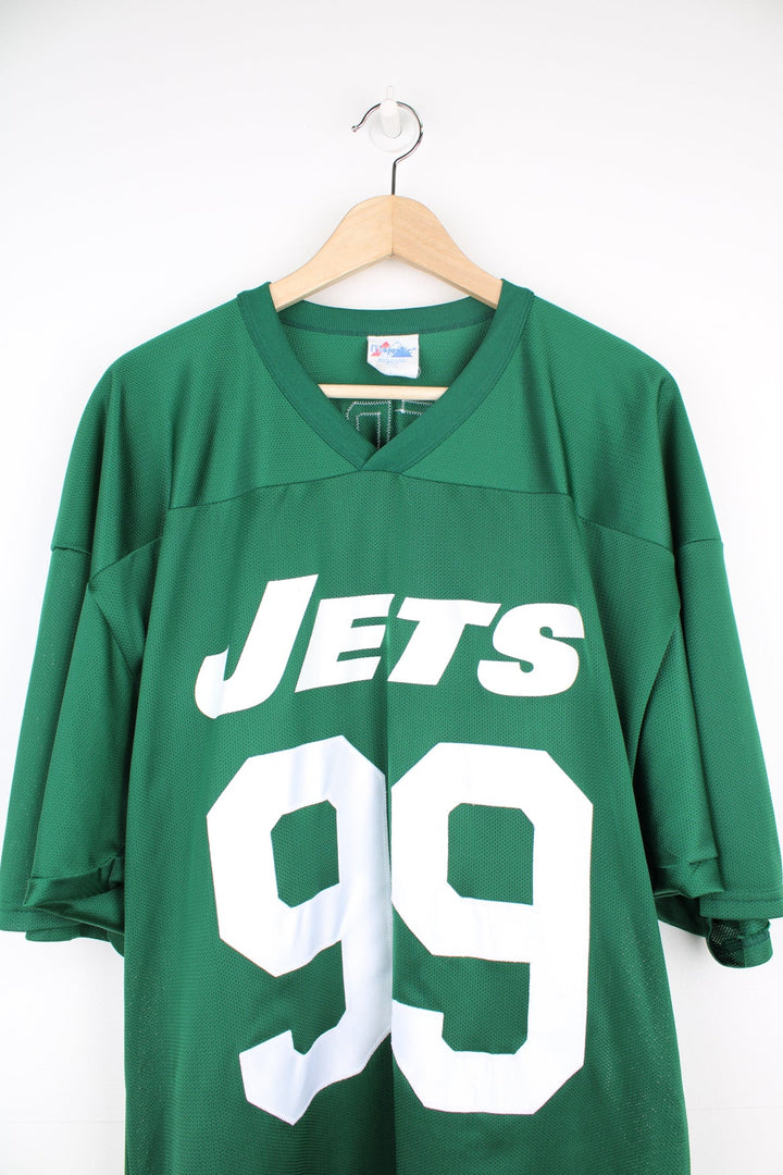 Vintage New York Jets green football jersey by Majestic. Features embroidered spell-out 'Stephie' on the back