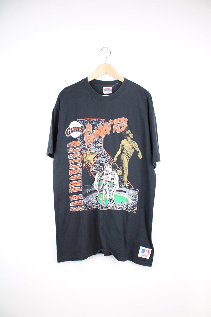 Vintage 1991 San Francisco Giants MLB black t-shirt with printed Giants graphic on the chest. Made in the USA by Nutmeg with single stitch seams