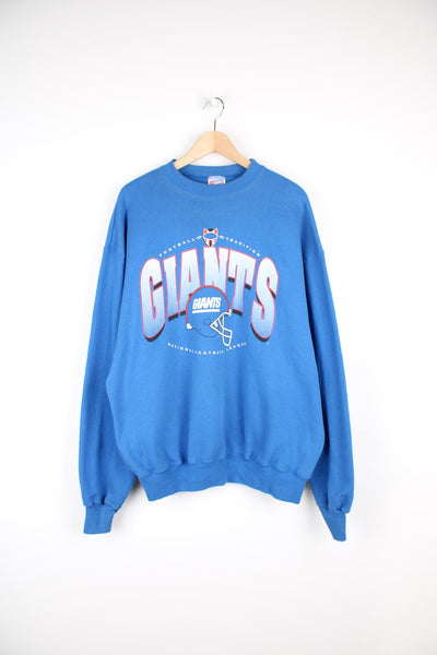 Vintage New York Giants sweatshirt with print across the chest.