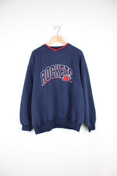 Vintage Houston Rockets Sweatshirt with embroidered logo across the chest.
