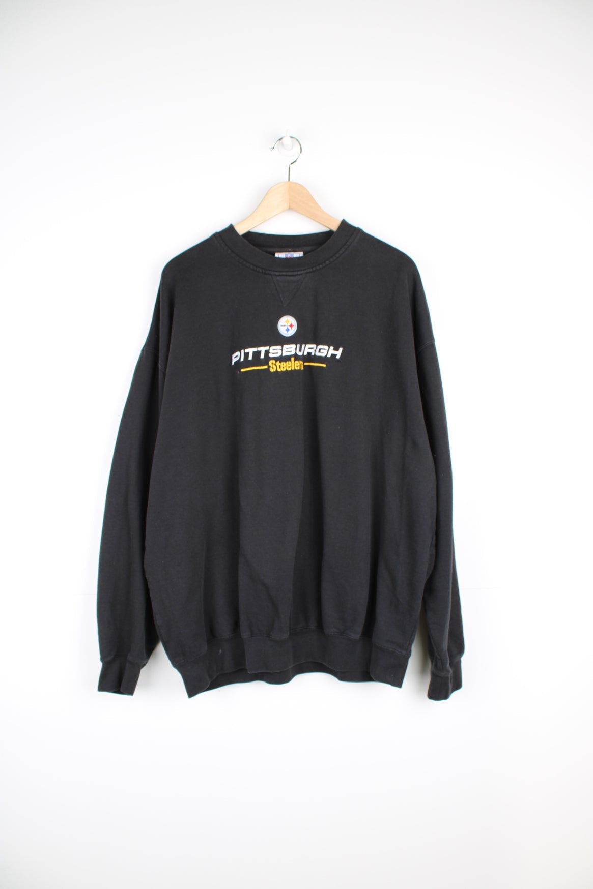 Pittsburgh Steelers sweatshirt with embroidered logo across the chest.